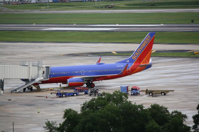 Boeing 737-700 (N297WN) - Southwest Flight 3220 (N297WN) sits at the gate at Tampa International Airport following a flight from Indianaplis International Airpor