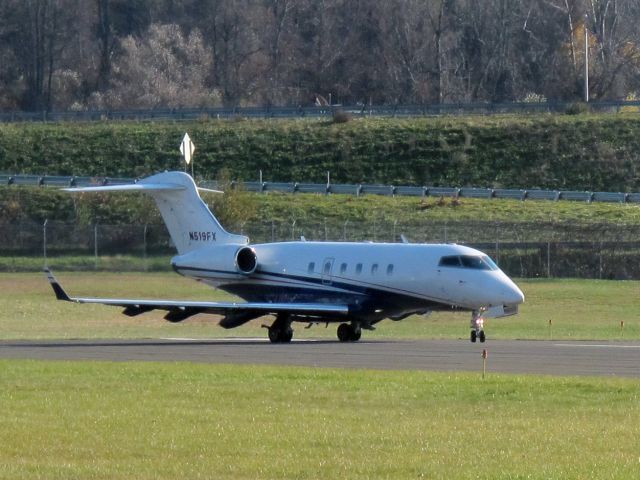 Bombardier Challenger 300 (N519FX) - Flexjet taking off runway 26 at Danbury CT.