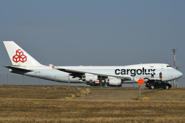 Boeing 747-400 (LX-FCL) - A couple of friends getting a shot of a Cargolux Boeing 747-467(F) departing YYC on Apr 28.