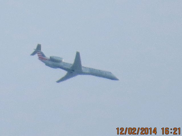 Embraer ERJ-145 (N636AE) - American Eagle flight 3646 from ORD to TUL over Baxter Springs Kansas at 25,000 feet.