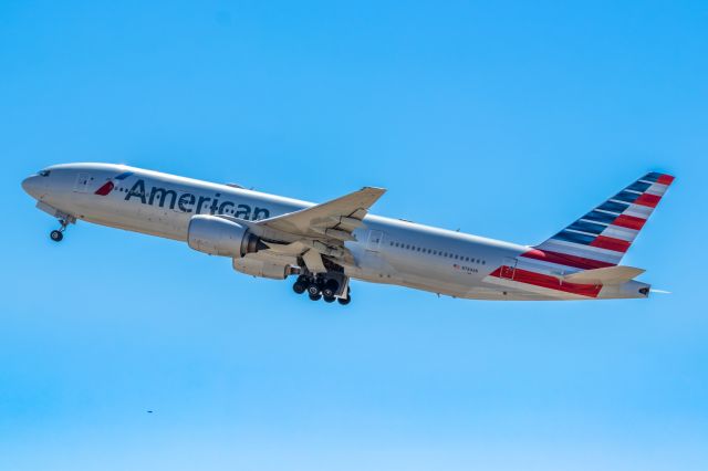 Boeing 777-200 (N784AN) - American Airlines 777-200 taking off from PHX on 10/9/22. Taken with a Canon 850D and Rokinon 135mm f/2 manual focus lens.