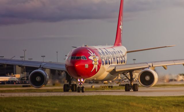 Airbus A330-200 (HB-IQI) - Taken at Pin Chasers, in front of the 18s :) How beautiful is this bird?!