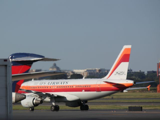 Airbus A319 (N742PS) - PSA Livery at DCA on 08/12/2011