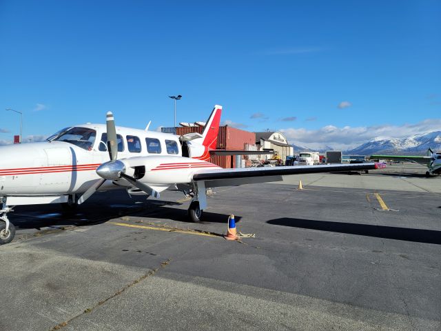 Piper Navajo (N828KT) - Siting on the ramp getting ready to go.