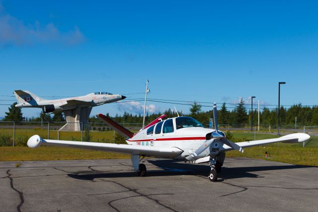 Beechcraft 35 Bonanza (C-FMBE) - Beech Bonanza parked on the apron in Thetford Mines QC.
