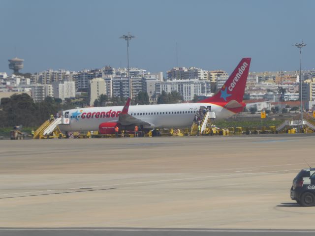 Boeing 737-800 (PH-CDF) - Corendon B737-800(WL) PH-CDF while boarding. Photo made 23.09.2016 from off A320-200(WL) D-AEWB EW1643, seat 07A, while taxiing to rwy 28.