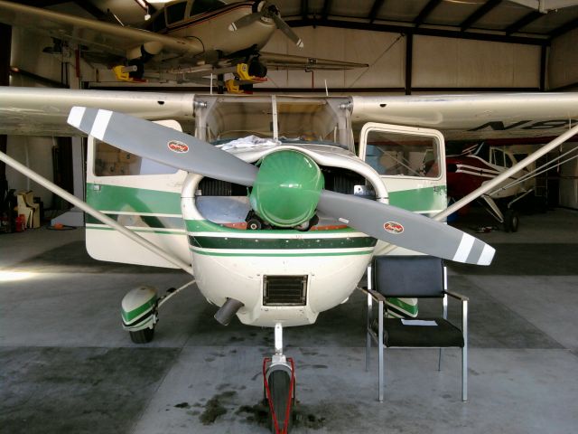 Cessna 175 Skylark — - A 1961 Cessna Skylark 175 during  preflight, ready to buzz around the valley.