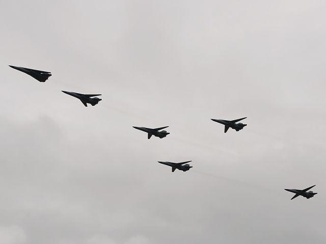 Grumman EF-111 Raven — - Royal Australian Airforce F11Cs in formation prior to decommissioning. Note the wing positions of each aircraft.