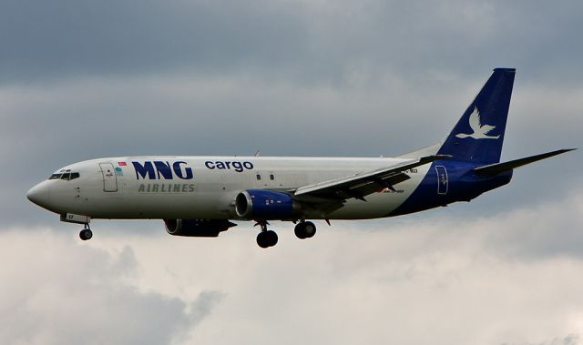 Boeing 737-700 (TC-MCF) - Bad light, bad weather sorry for the quality. That Aircargo Plane is very rare, mostly in the Night in Action....