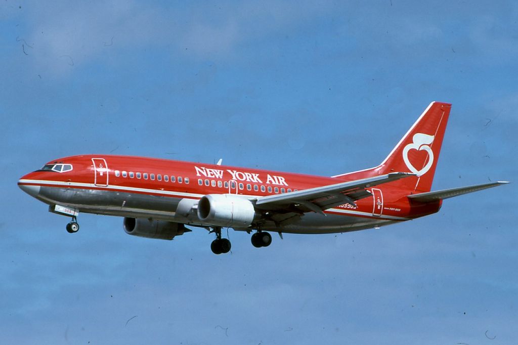 BOEING 737-300 (N63305) - New York Air Boeing 737-3T0br /First flight: July 29, 1985br /pic made in December 1985, scan from my Kodachrome 64 slide