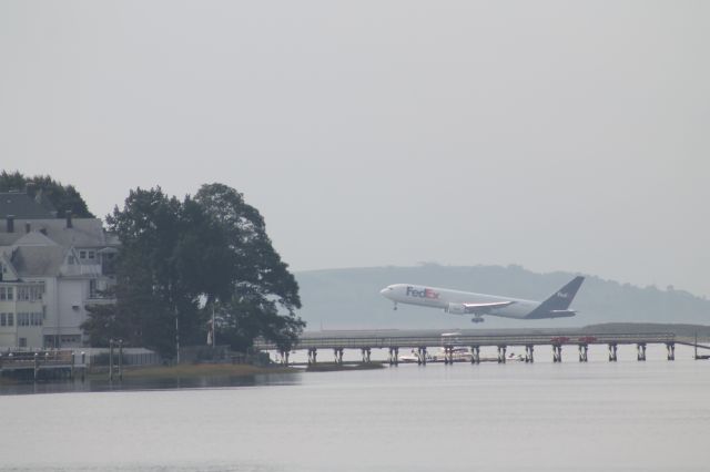 BOEING 767-300 — - FedEx 767 just after leaving the ground at Logan.