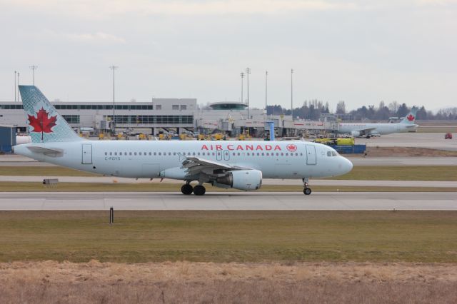 Airbus A320 (C-FGYS) - Spotting by 26R/08L. An Air Canada A320 slowing down on 26R.