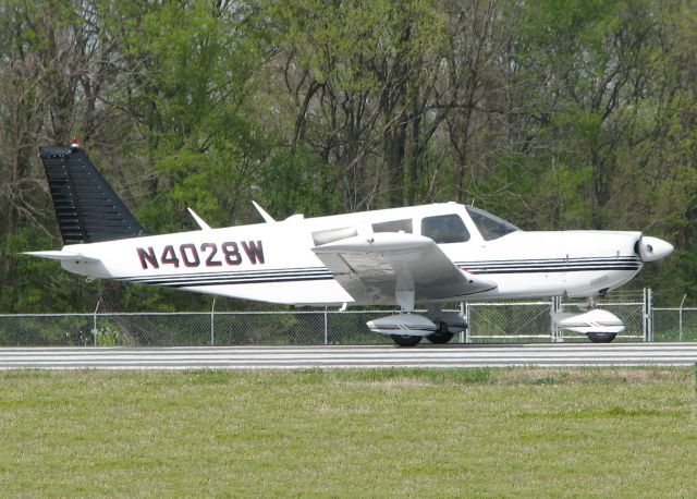 Piper Cherokee (N4028W) - Starting to roll for take off on runway 14 at the Shreveport Downtown airport.