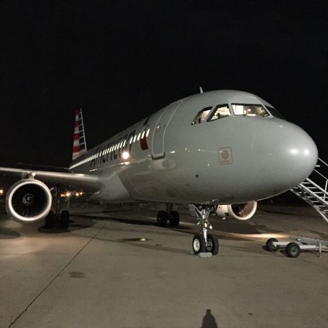 Airbus A320 (N653AW) - N653AW fresh out of the paint shop wearing her new American colors. 