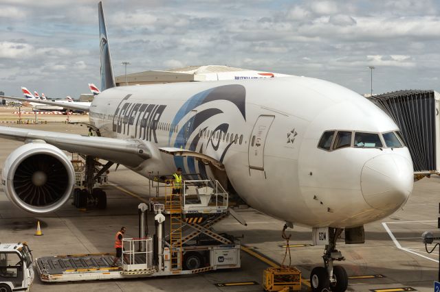 BOEING 777-300ER (SU-GDM) - 10th August, 2024: Parked at the gate at Heathrow Terminal 2 after arriving from Cairo as flight MS 777. 