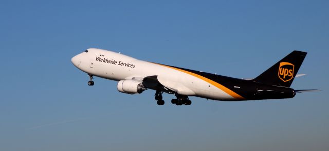 BOEING 747-8 (N605UP) - Shortly after departure is this 2017 United Parcel Express Boeing 747-8F in the Winter of 2022.