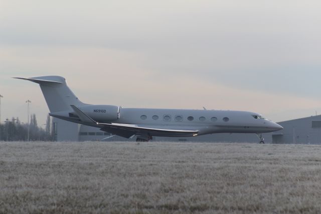 Gulfstream Aerospace Gulfstream G650 (N691GD) - A Gulfstream G650ER slowing down after landing at Stansted Airport.br /br /Location: Belmer Road, Stansted.br /Date: 11.12.22 (dd/mm/yy).