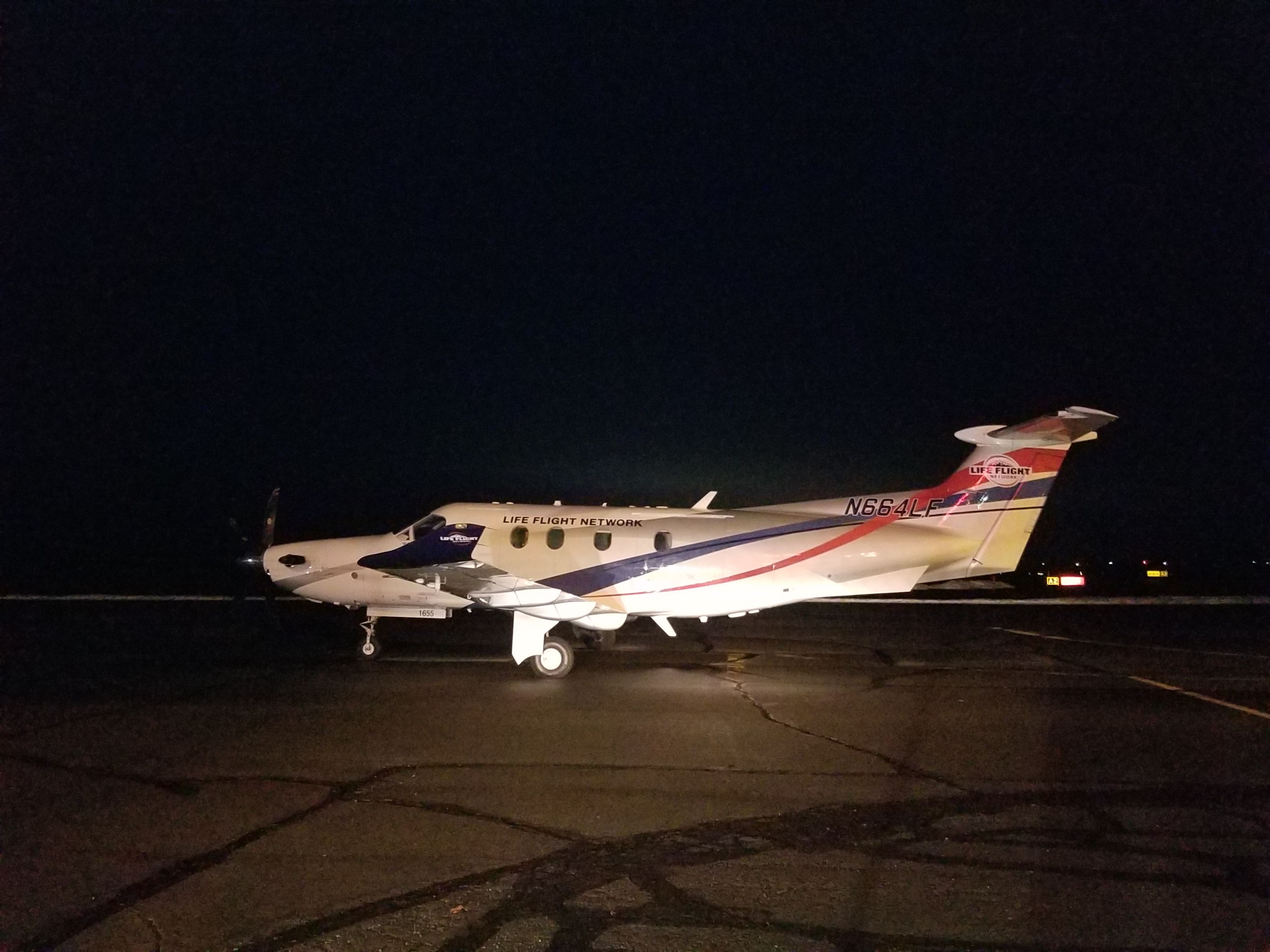 Pilatus PC-12 (N664LF) - Standing in the airport administration  parking area. 