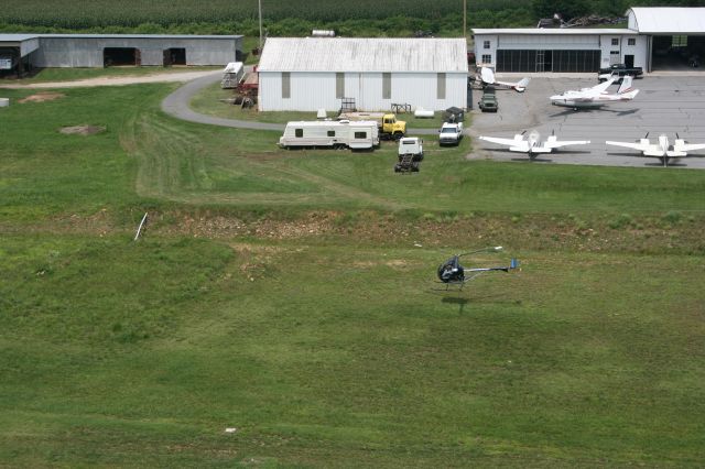 N7089S — - HOVER... MAINT SHOP IN BACK GROUND. AND A VERY NICE 93 INTL ALL WHEEL DRIVE!