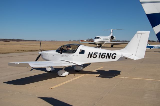 Aircraft Factory Sling 2 (N516NG) - Looking north on the ramp of Ottawa Municipal with a Gulfstream(?) In the background.