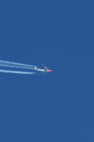 Boeing 747-400 (OO-THB) - Flying over BOS after departing JFK.