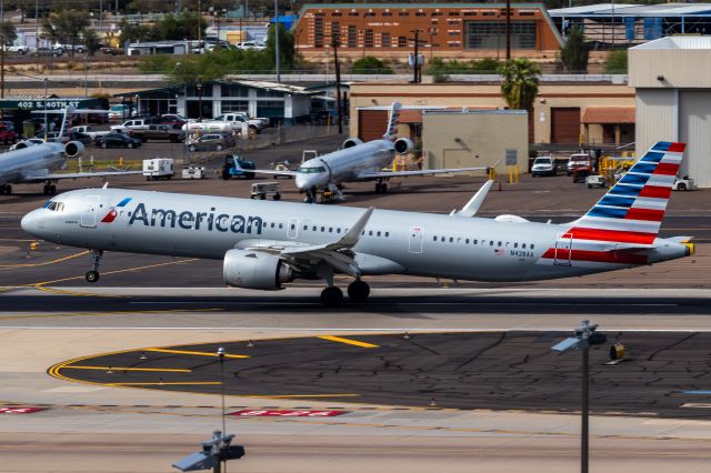 Airbus A321neo (N428AA) - American Airlines A321 neo landing at PHX on 9/10/22. Taken with a Canon 850D and Tamron 150-600mm G2 lens.