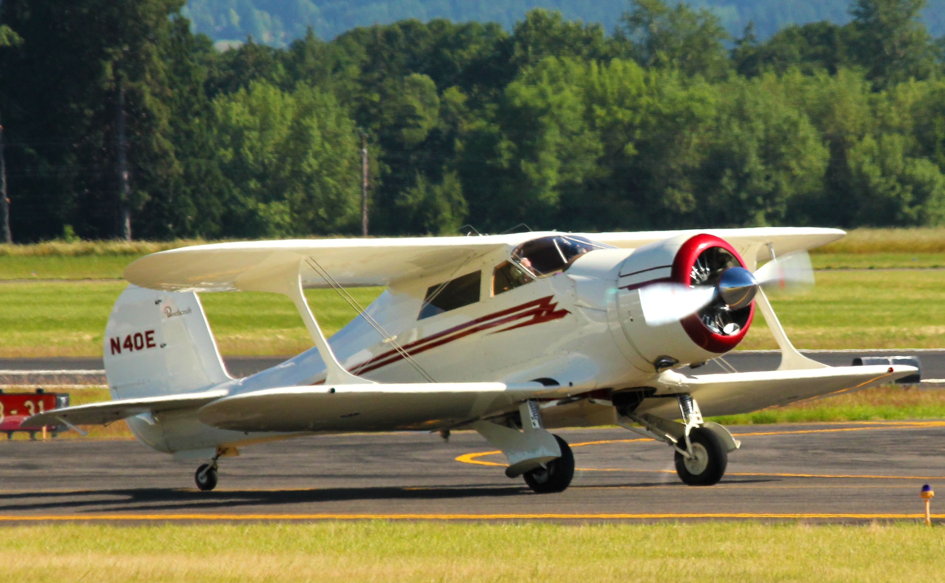 Beechcraft Staggerwing (N40E) - 1944 Beech D17S. Beech Staggerwing. 450 Horsepower. About to depart RWY 31 Hillsboro, Oregon.