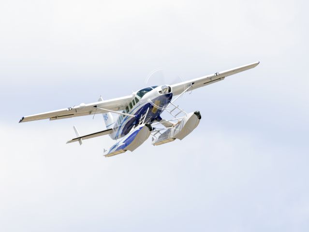 Cessna Caravan (N773BH) - Take off 22R. Canon 600mm lens. 08-AUG-2022. An unusual view.