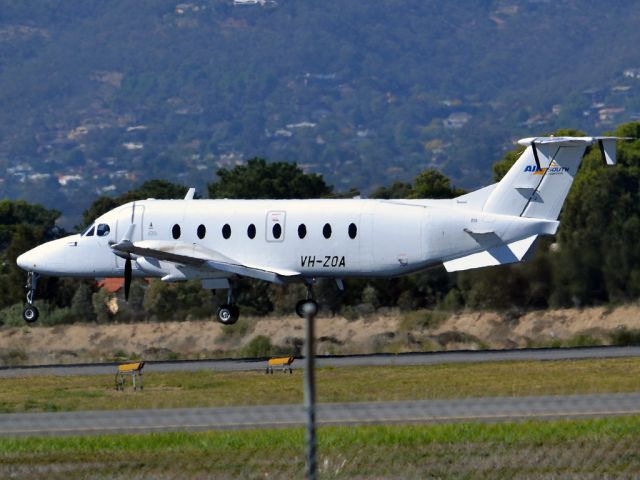 Beechcraft 1900 (VH-ZOA) - About to put down on runway 05. Thursday 12th April 2012.