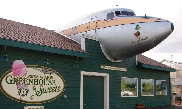 Douglas DC-6 (N999SQ) - The nose of DC-6 N999SQ now graces the Greenhouse and Sweet shop at Pikes landing a few hundred yards from Fairbanks International , Alaska