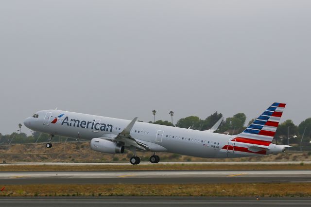 Airbus A321 (N115NN) - Early morning takeoff from runway 24L LAX, Los Angeles International Airport, California