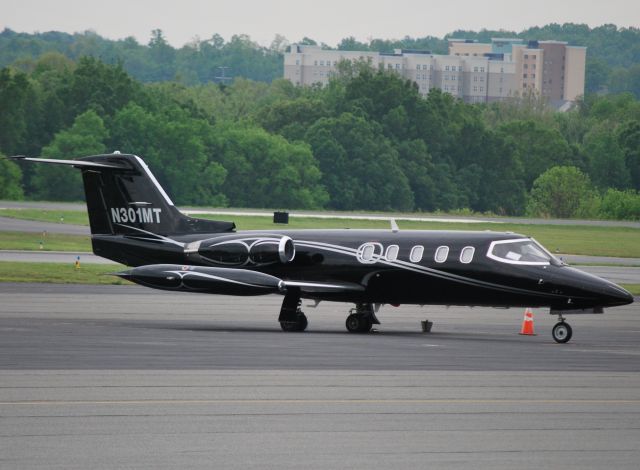 Learjet 25 (N301MT) - BAY VENTURE MANAGEMENT LLC at KJQF - 4/21/11