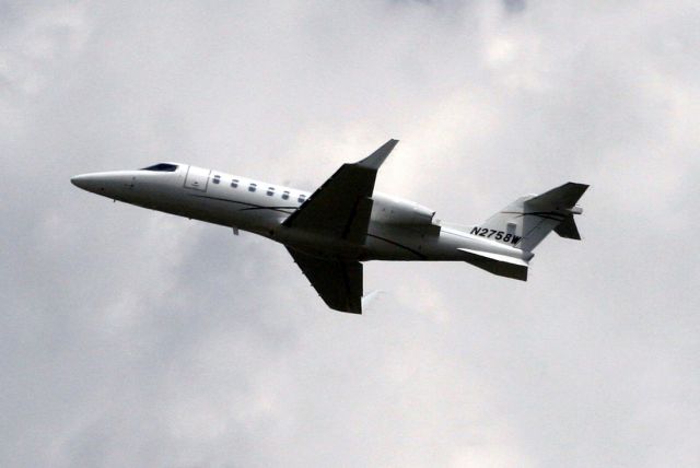 Learjet 40 (N2758W) - Airborne off R36C on 02-Aug-10.
