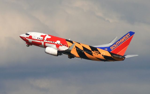 N214WN — - Southwest 737-700 in the "Maryland" color scheme departs runway 31at Nashville