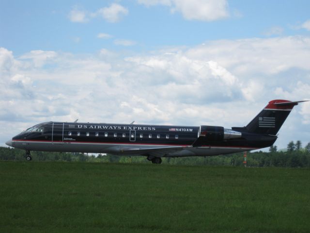 Canadair Regional Jet CRJ-200 (N410AW) - Taxiing on Alpha towards runway 33.