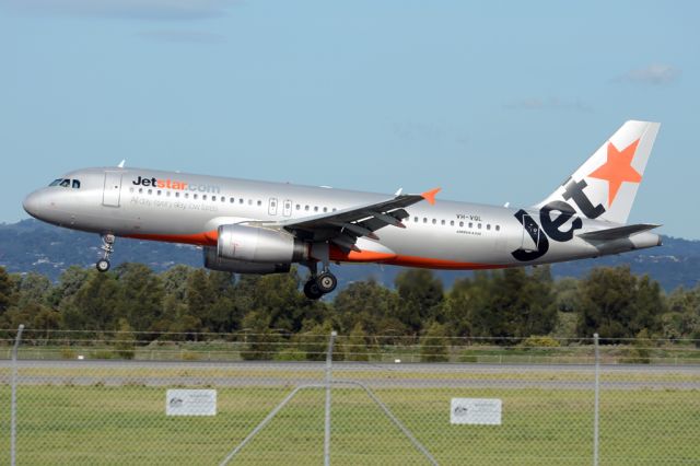 Airbus A320 (VH-VQL) - About to put down on runway 05. Wednesday, 21st May 2014.