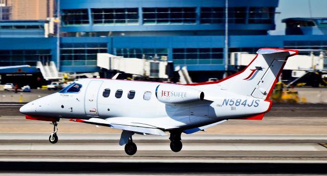 Embraer Phenom 100 (N584JS) - N584JS Embraer-empresa Brasileira De EMB-500 C/N 50000140 -   Las Vegas - McCarran International (LAS / KLAS) USA - Nevada, October 14, 2011 Photo: Tomás Del Coro