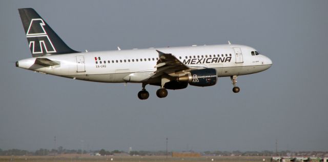 Airbus A319 (XA-UAQ) - Flashback (Thirteen years ago back to 2009) ~~br /MXA's XA-UAQ (ex Skyservice as C-GJUK, then with Mexicana as seen above, then WFU in 2010, then to TACA International as N990TA, then to Avianca as N990TA, then to Saudi Arabian as D-ASPA, to storage in 2018) in the late afternoon on very s/final to SMF.