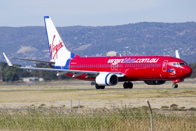 Boeing 737-800 (VH-VUT) - On taxi-way heading for take off on runway 05. Friday 19th April 2013.