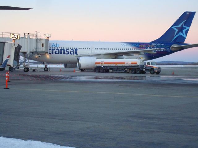 Airbus A310 — - Air Transat Airbus A310 at YQB (12/8/13)