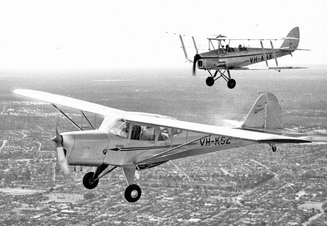 TAYLORCRAFT (2) J (VH-KSZ) - Adventurer flying over Perth 14th July 1950 in company with Tiger Moth VH-AMX. From Geoff Goodalls fabulous collection. Still registered today.