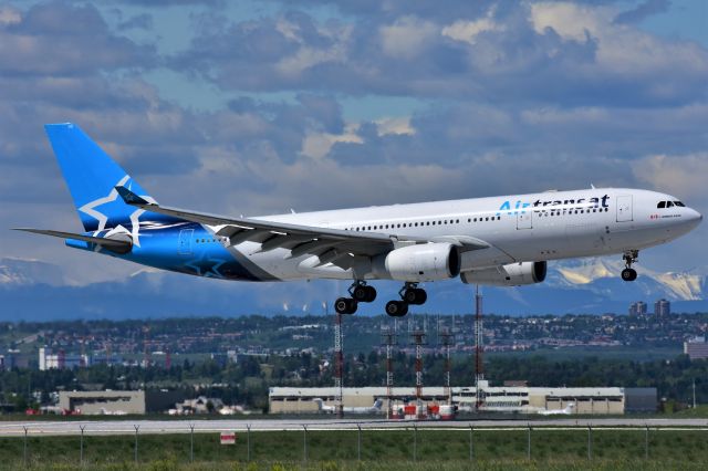 Airbus A330-200 (C-GUBF) - Air Transat Airbus A330-243 arriving at YYC on June 9.