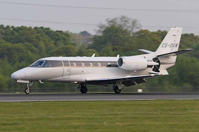 Cessna Citation V (CS-DXW) - One of NetJets many planes landing on 05R at Manchester