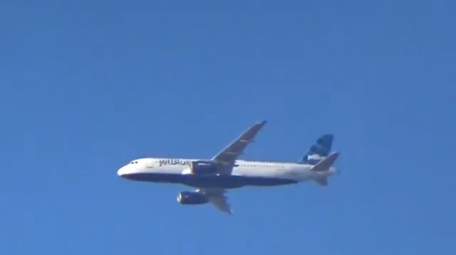 Airbus A320 (N554JB) - Caught while watching a football practice.