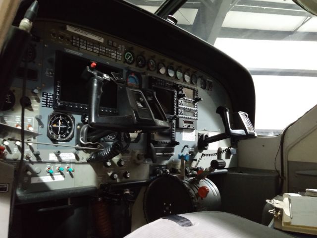 Cessna Caravan — - Cockpit of Iron Air C208 (I didnt realize how hard it would be to take this picture originally)