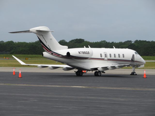 Bombardier Challenger 300 (N786QS) - This NetJets Challenger 300 sits on the ramp before departing to Jackson Hole, Wyoming.