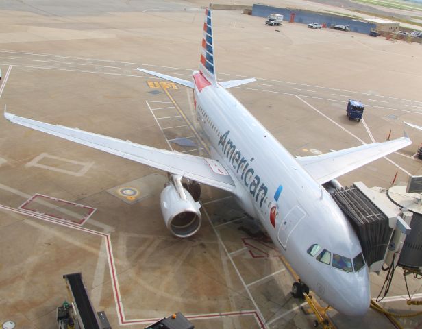 Airbus A319 (N752US) - View from the sky train at DFW.