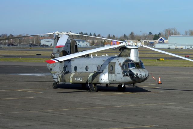 Boeing CH-47 Chinook (N160CZ) - Ex-Army CH-47D Chinook parked on the ramp in Salem (KSLE/SLE) after arriving from Medford (KMFR/MFR).