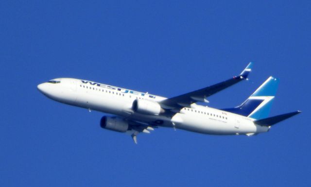 Boeing 737-800 (C-GWBL) - Shown here is a WestJet Boeing 737-8 a few minutes until landing in the Summer of 2016.