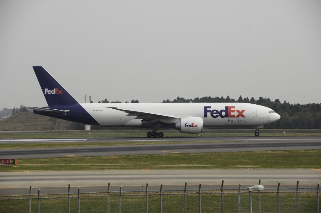 Boeing 777-200 (N853FD) - Departure at NRT Airport Runway 16L on 2011/11/3